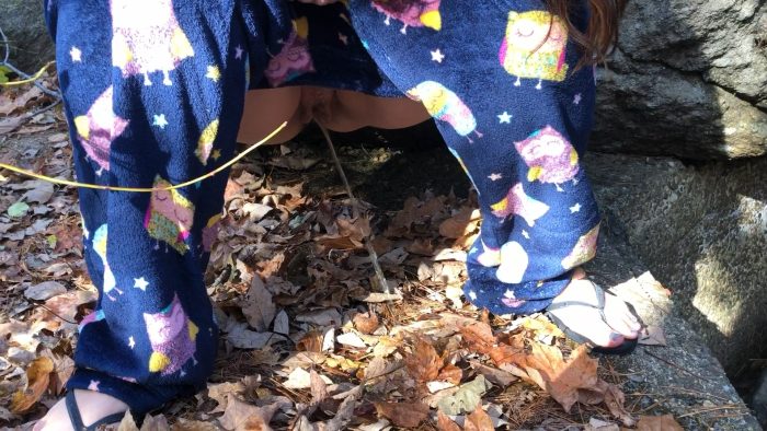 Wife pissing outside in the leaves